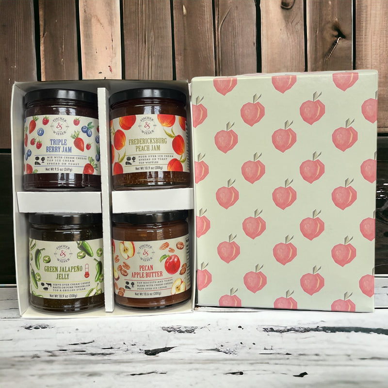This gift set includes: Fredericksburg Peach Jam Green Jalapeño Jelly Pecan Apple Butter Triple Berry Jam Peach gift box 
