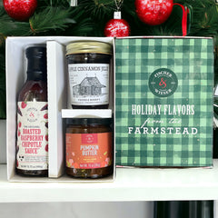 This gift set includes: The Original Roasted Raspberry Chipotle Sauce Pumpkin Butter Spread Cinnamon Apple Jelly Peach gift box with holiday sleeve